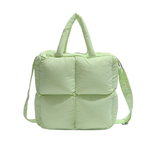 Chic mint green quilted puffer handbag with adjustable strap for women in trendy style