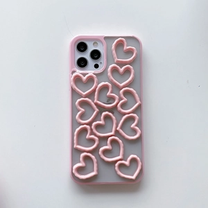 Close-up of pink translucent phone case featuring 3D hollow heart shapes for iPhone