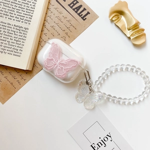 AirPods Pro clear case with pink embroidered butterfly and transparent beaded wrist strap