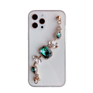 Custodia trasparente iPhone 16 Pro Max con bracciale di lusso in gemme verdi e strass