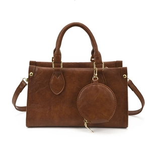 Vintage dark brown faux leather square tote bag with round purse and golden hardware