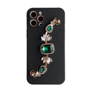 Luxury iPhone case with emerald gemstones and sparkling diamond jewelry chain strap