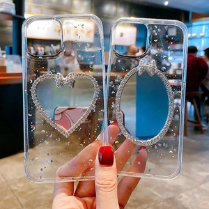 Macro shot of glittery iPhone case with rhinestone frames and 3D bow decoration