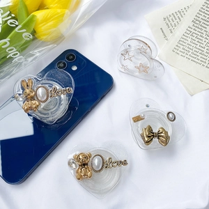 Foldable heart-shaped phone stands with vintage rabbit, bear, and pearl decorations