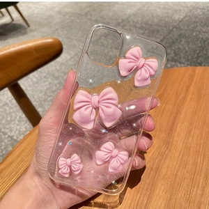 Glitter transparent iPhone case with pink 3D bows and a matte finish for women