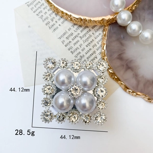 Detail view of square pearl rhinestone phone grip showing 44mm dimensions and luxury design