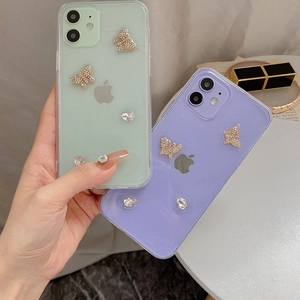 Detail view of iPhone case with 3D glitter rhinestones and butterfly ornaments