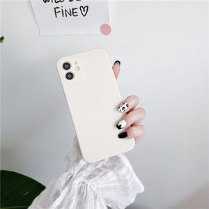 Silicone iPhone case in creamy white finish with precise camera cutouts for 15 Pro Max