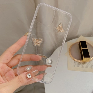 Close-up of glitter phone case with golden rhinestone butterflies for iPhone 16 Pro Max