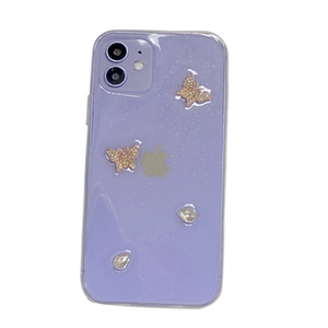 Glitter purple iPhone case with golden butterfly ornaments and rhinestone accents