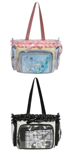Detail view of ita bags featuring clear PVC windows with bows and ruffle trim decoration