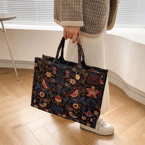 Floral embroidered dark blue canvas tote bag with bird patterns for daily casual use