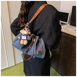 Denim shoulder bucket bag with drawstring closure and cute teddy bear charm pendant