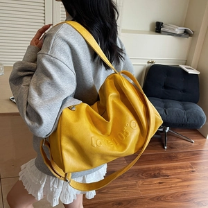 Bright yellow large capacity tote bag with Love 105 degree embossed leather texture