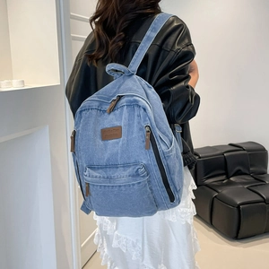 Fashionable light blue denim backpack for students with multiple functional zipper pockets