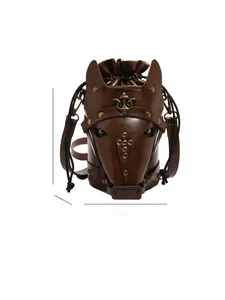 Detail of dark brown horse-shaped bag with vintage metal studs and fleur-de-lis patterns