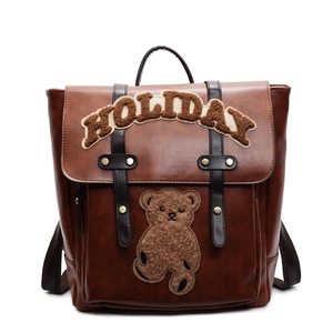 Retro brown PU leather backpack with cute bear patch and holiday lettering design
