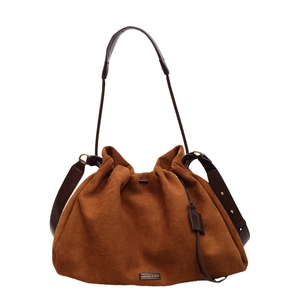 Brown suede tote bag with pleated design and adjustable shoulder strap for women