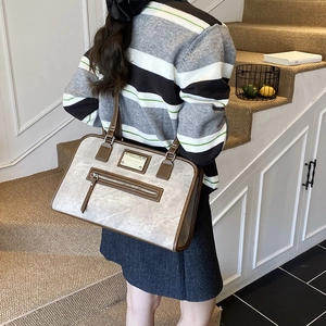 Retro grey marble pattern shoulder bag with brown leather trim and metal logo