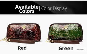 Detail of red and green vintage wristlets with embossed floral leather texture