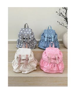 Detailed collection of polka dot and leopard print backpacks with stylish pleated skirt bases