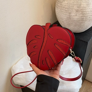 Red maple leaf shaped shoulder bag in PU leather with sequins and gold hardware