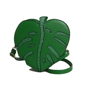 Unique green monstera leaf shaped crossbody bag in PU leather with sequin detailing