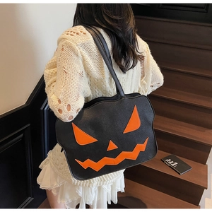 Detailed back view of model wearing a stylish pumpkin-shaped shoulder bag in black leather