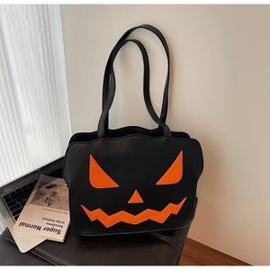 Halloween pumpkin shoulder bag featuring a classic orange face on high-quality black material