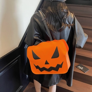 Stylish Halloween pumpkin shaped shoulder bag in orange and black faux leather
