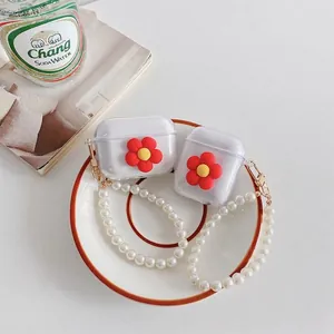 Transparent TPU AirPods case with 3D red flower and elegant pearl wrist strap bracelet