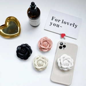 3D camellia airbag phone grip in four colors with premium leather texture finish