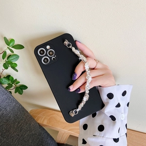 Matte black iPhone case with sparkling crystal hand chain and precise lens cutouts