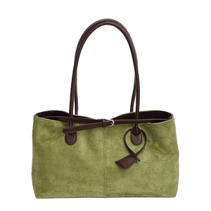 Vintage green suede tote bag with brown leather handles for women's daily commute