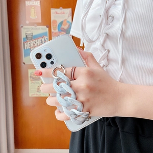 Clear iPhone case with chunky grey marble resin chain strap held by silver rings