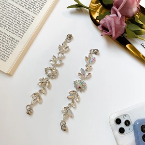 Detail of silver leaf vine crystal patches for DIY shoes and hair accessory decor