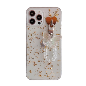 Transparent iPhone case with gold foil details and butterfly beaded bracelet charm
