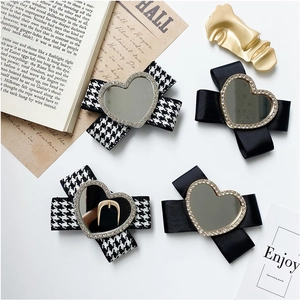 Chic bow hair clips with heart-shaped rhinestone mirrors in houndstooth and black silk