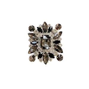 Foldable rhinestone phone stand with luxury geometric crystal design on a clean white background