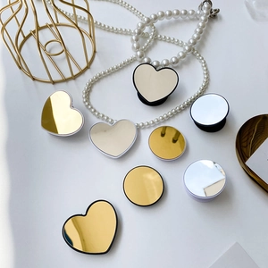 Foldable heart and round mirror phone sockets in gold and silver finish with pearls
