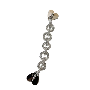 Sparkling silver chain bracelet with rhinestone circles and dual heart pendants