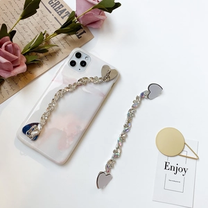 Colorful rhinestone heart phone case chain accessory with sparkling wave pattern design