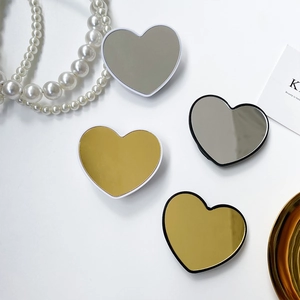 Set of four heart-shaped folding mirror phone stands in gold and silver finish