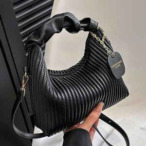 Fashionable black pleated cloud handbag for women with twisted handle and metal chain strap