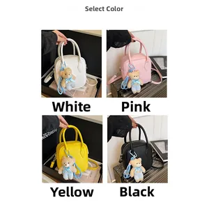 Chic square bags in white, pink, yellow, and black with cute bear charms and straps