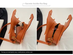 Internal view of pumpkin bag showing capacity for phone, wallet and cosmetics