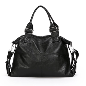 Black large capacity tote bag with textured faux leather and adjustable shoulder strap