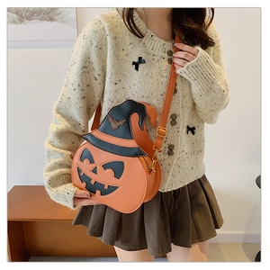 Close-up of matte PU pumpkin crossbody bag with black wizard hat for Halloween style