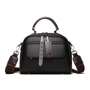 Black leather Boston bag with brown trim and wide shoulder strap in front view