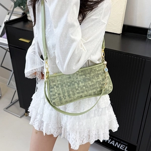 Minimalist green woven leather pillow shoulder bag with golden hardware for women